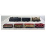 Marx O Gauge streamlined steam windup, NYC tender, 552 RI gondola, 553 SF Middle States, 1678 NP General Coal, 555 C&S red roof refrigerator, 556 NYC caboose