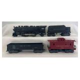 Marx O Gauge 666 2-4-2 die-cast steam locomotive with plastic Canadian Pacific tender, 339234 CP gondola, 2366 CP caboose