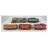Unique Lines O Gauge 742 lithographed W/U loco and tender, Jewel Tea Circus animal car, hopper, caboose