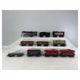 Marx O Gauge Marlines electric 0-4-0, CP & NYC tenders, 552 Rock Island, 554 General Coal, flat car w/load restraint, two 556 caboose 3/16" scale 8-wheel trains