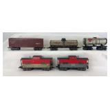 Marx O Gauge 3/16" scale 8-wheel freight trains; 13975 brown AT&SF, 553 SF Middle States, 256 Niacet, two 20102 NYC