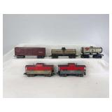 Marx O Gauge 3/16" scale 8-wheel freight trains; 13975 brown AT&SF, 553 SF Middle States, 256 Niacet, two 20102 NYC