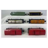 Prewar Lionel O Gauge 2652 gondola, 2679 Baby Ruth, 2680 Shell, 2680 Sunoco, two 2657 caboose freight