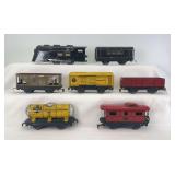 Marx O Gauge electric Commodore Vanderbilt, NYC tender, 552 all red RI gondola, 553 SF yellow, 91453 C&S yellow, 1678 NP General Coal hopper, 694 NYC caboose
