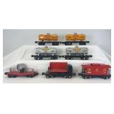 Prewar Lionel O Gauge 2620 searchlight, two 2654 Shell, two 2654 Sunoco, 3659 automatic dump, 2657 caboose freight