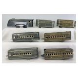 Marx O Gauge New York Central Mercury streamlined steam locomotive, two tenders, Toledo coach, two Cleveland coaches, Detroit obs