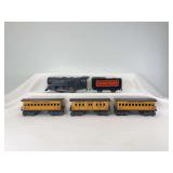 Marx O Gauge 0-4-0 steam loco, Canadian Pacific tender,  StP&P passenger cars No. 1, and two No. 3