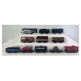 Marx O Gauge electric steam 0-4-0 steam NYC loco and tender with 4-wheel tinplate freight; cable reel, 738701, flat w/dump truck, 91257 Seaboard, 19847 Sinclair tank, 556 NYC caboose