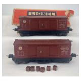 Prewar Lionel O Gauge: two 3814 operating merchandise cars with heat stamp lettering