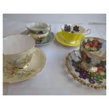 Four Decorative Teacup and Saucer Pairs