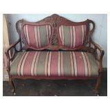 Carved Wooden Loveseat with Striped Upholstery