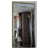 Gold-Framed Wall Mirror with Arch Design