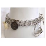 Sterling Silver Charm Bracelet with Unique Pendant