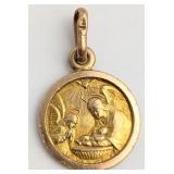 A 10 KTGold Religious Medallion Pendant Depicting