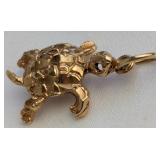 A 10KT Gold Turtle Pendant
