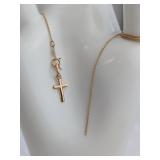 A 10 KT Gold Cross Pendant and Chain