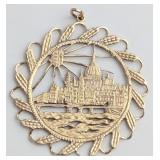 A 14 KT Gold Cityscape Pendant DepiKTing St Paul's
