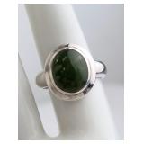 A Sterling Silver and Green Hardstone Cabochon Rin