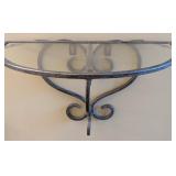 A Contemporary Wrought Iron and Glass Wall Shelf