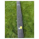 A Mottled Gray and Black  Indoor-Outdoor Rug