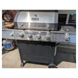 A Dyna-Glo Four-Burner Propane Gas Grill