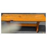 A Rustic Pine Trestle-Style Bench