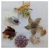 Costume Brooches Including Butler and Laura