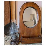 Wood wall mirror & amber glass oil lamp