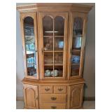 Honey oak display cabinet