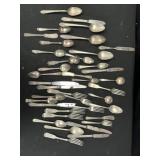 Multiple Silver Spoons, Forks, Knives