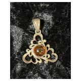 Sterling Silver Pendant with Amber Colored Stone