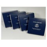 Four 2004/2005 Westward Journey Coin & Medal Sets