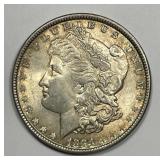 1884 Morgan Silver $1 About Uncirculated AU Toned