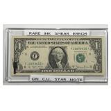 1977-A $1 FRN Star Note with Black Ink Smear Error