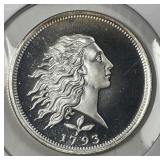 1/2 oz Silver Art Round Flowing Hair Design .999