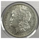 1889-O Morgan Silver $1 About Uncirculated AU