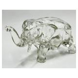 Glass elephant covered container
