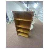 Wood shelf with 4 shelves. 25 in by 46 in