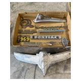 Antique automotive signs and emblems