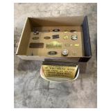 Old tags and a box of signs