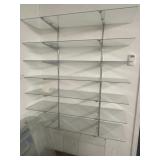 Glass shelves with metal brackets. 7 shelves that