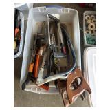 Bin of various saws.