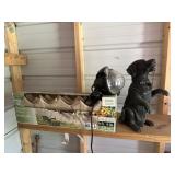 Flagstone edging, light and dog statue