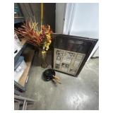 Fall decor, picture frame and cast iron pans.