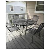 Wrought iron patio set with 5 chairs