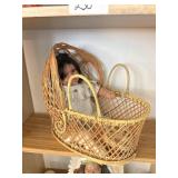 Indian doll in wicker basket