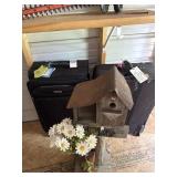 2 suitcases and birdstand