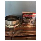 Various cake pans and a scanner.