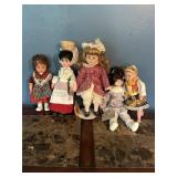 5 vintage dolls.