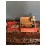 Toy sewing machine and vintage food grinder.